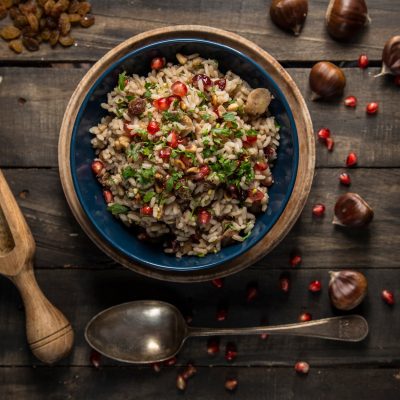 Pilaf with chestnuts, currants, pomegranate and kernel seeds